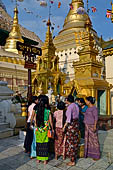 Yangon Myanmar. Shwedagon Pagoda (the Golden Stupa). Locals pray at the station around the base of the pagoda that represents the day they were born.  